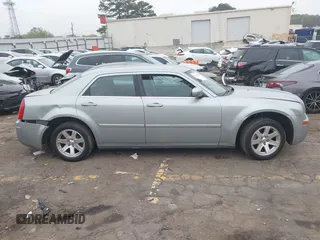 2006 Chrysler 300 Touring with VIN 2C3KA53G56H112376, listed as a IAAI auction lot 41919098 with 309,184 mi miles. Bid and sale history available at carsss.com. Image 13.