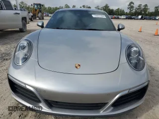 2018 Porsche 911 Carrera z VIN WP0AA2A93JS105437, wystawiony jako Copart lot #78437934 z przebiegiem Nie podano mil oraz Szkoda całkowita • Salvage title. Historia ofert i sprzedaży dostępna na DreamBid. Obrazek 5.