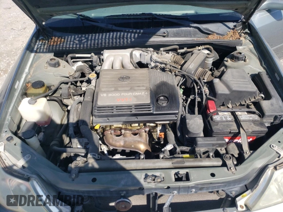 2001 Toyota Avalon XL z VIN 4T1BF28B51U184110, wystawiony jako Copart lot #52398285 z przebiegiem 127 179 mil mil oraz Szkoda całkowita • Salvage title. Historia ofert i sprzedaży dostępna na DreamBid. Obrazek 11.