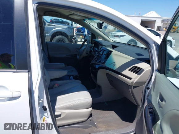 2011 Toyota Sienna LE AAS with VIN 5TDKK3DC1BS150109, listed as a IAAI auction lot 42067808 with 186,811 mi miles and . Bid and sale history available at DreamBid. Image 5.