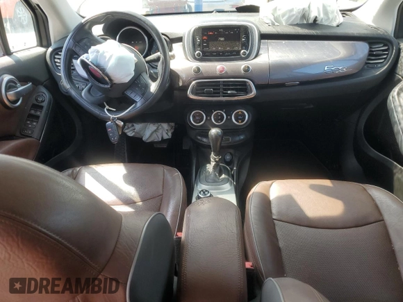 2017 FIAT 500X Lounge with VIN ZFBCFXDB7HP518161, listed as a Copart auction lot 60134985 with 51,357 mi miles and Salvage title. Bid and sale history available at DreamBid. Image 8.