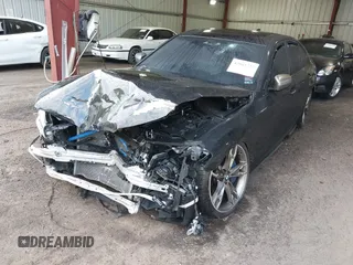 2018 BMW 5 Series M550i xDrive with VIN WBAJB9C51JB035949, listed as a IAAI auction lot 42085727 with Not provided miles and . Bid and sale history available at DreamBid. Image 16.