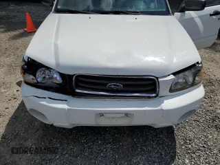 2003 Subaru Forester XS with VIN JF1SG65663H729152, listed as a Copart auction lot 58026535 with 174,141 mi miles and Salvage title. Bid and sale history available at DreamBid. Image 12.