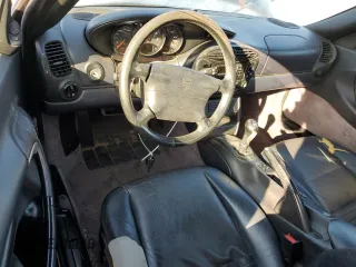 2000 Porsche Boxster с VIN WP0CA2989YU627749, выставлен на аукционе Copart как лот 54054305 с пробегом 189 173 миль миль и Списание • Salvage title. История ставок и продаж доступна на DreamBid. Изображение 8.