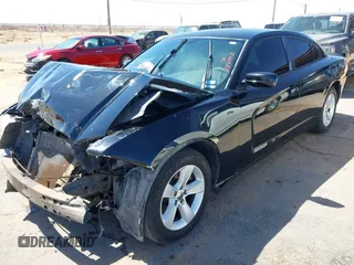 2013 Dodge Charger SE with VIN 2C3CDXBG8DH628382, listed as a IAAI auction lot 41850950 with 252,392 mi miles and . Bid and sale history available at DreamBid. Image 19.