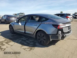 2025 Tesla Model 3 Long Range with VIN 5YJ3E1EA8SF890337, listed as a Copart auction lot 45023425 with 1,765 mi miles and Salvage Title. Bid and sale history available at DreamBid. Image 2.