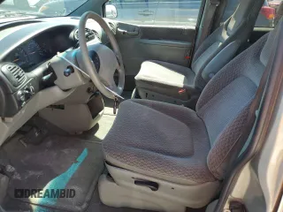 1999 Dodge Caravan SE with VIN 1B4GP44G5XB904043, listed as a Copart auction lot 77331804 with 105,141 mi miles and Clean Title. Bid and sale history available at carsss.com. Image 7.