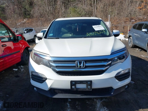 2016 Honda Pilot EX-L with VIN 5FNYF6H50GB073384, listed as a IAAI auction lot 41639667 with 99,267 mi miles. Bid and sale history available at carsss.com. Image 12.