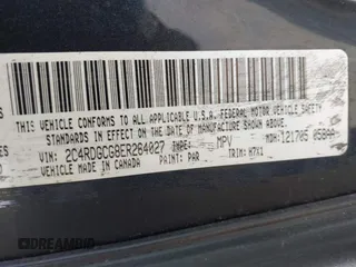2014 Dodge Grand Caravan SXT with VIN 2C4RDGCG8ER264027, listed as a IAAI auction lot 42018350 with 311,876 mi miles and . Bid and sale history available at DreamBid. Image 9.