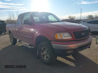 2001 Ford F-150 XL with VIN 1FTRX18L21NB46718, listed as a IAAI auction lot 41477101 with 156,702 mi miles. Bid and sale history available at carsss.com. Image 1.