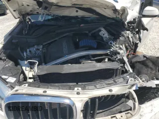 2014 BMW X5 xDrive35i with VIN 5UXKR0C52E0H20513, listed as a Copart auction lot 52831615 with 111,414 mi miles and Salvage Title. Bid and sale history available at carsss.com. Image 13.