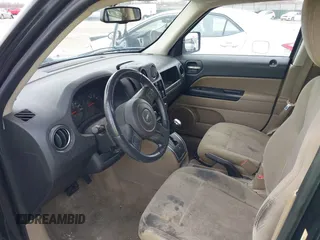 2013 Jeep Patriot Latitude with VIN 1C4NJPFB2DD233848, listed as a IAAI auction lot 41711832 with Not Provided miles. Bid and sale history available at carsss.com. Image 5.