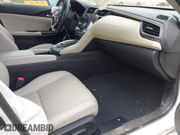 2022 Honda Insight Touring с VIN 19XZE4F95NE004694, выставлен на аукционе IAAI как лот 42253089 с пробегом 40 142 миль миль и . История ставок и продаж доступна на DreamBid. Изображение 5.