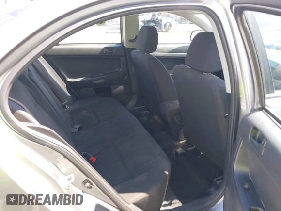 2014 Mitsubishi Lancer SE with VIN JA32V2FWXEU001902, listed as a IAAI auction lot 42116913 with 117,335 mi miles and . Bid and sale history available at carsss.com. Image 8.