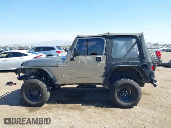 2005 Jeep Wrangler Sport with VIN 1J4FA49S65P342497, listed as a IAAI auction lot 41674606 with 123,457 mi miles. Bid and sale history available at carsss.com. Image 14.