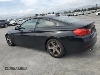 2014 BMW 4 Series 428i with VIN WBA3N7C55EF719986, listed as a Copart auction lot 56692685 with 74,377 mi miles and Salvage title. Bid and sale history available at DreamBid. Image 2.