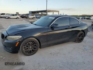 2014 BMW 2 Series 228i with VIN WBA1F5C54EVV99497, listed as a Copart auction lot 42703515 with 135,719 mi miles and Salvage Title. Bid and sale history available at carsss.com. Image 1.