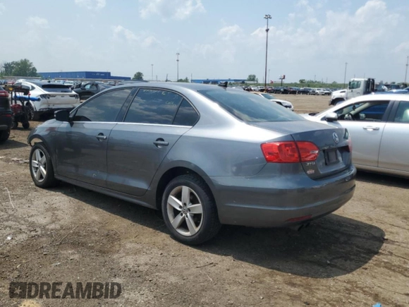 2013 Volkswagen Jetta TDI w/Premium with VIN 3VWLL7AJ6DM440499, listed as a Copart auction lot 60189355 with 148,786 mi miles and Clean title. Bid and sale history available at DreamBid. Image 2.