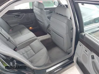 1997 BMW 7 Series 740il with VIN WBAGJ8324VDL43320, listed as a IAAI auction lot 41990660 with 193,998 mi miles. Bid and sale history available at carsss.com. Image 8.