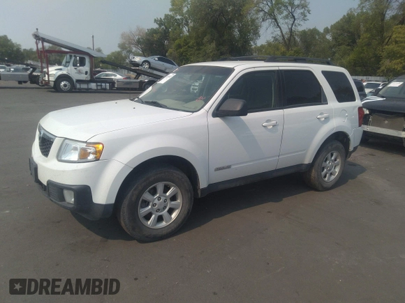 2008 Mazda Tribute Touring with VIN 4F2CZ96138KM32735, listed as a IAAI auction lot 31145122 with 206,608 mi miles and . Bid and sale history available at DreamBid. Image 2.