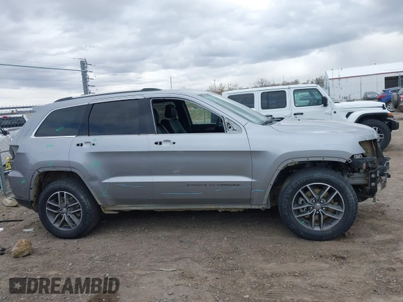 2018 Jeep Grand Cherokee Limited with VIN 1C4RJFBG5JC195417, listed as a IAAI auction lot 41861657 with 151,140 mi miles and . Bid and sale history available at DreamBid. Image 14.