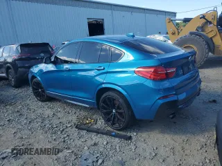 2017 BMW X4 M40i with VIN 5UXXW7C58H0U25599, listed as a Copart auction lot 61489334 with 115,001 mi miles and Salvage Title. Bid and sale history available at carsss.com. Image 2.