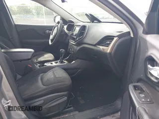2016 Jeep Cherokee Sport with VIN 1C4PJLAB0GW207556, listed as a IAAI auction lot 42070738 with 218,142 mi miles and . Bid and sale history available at DreamBid. Image 5.