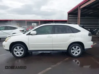 2007 Lexus RX 350 with VIN JTJGK31U870002338, listed as a IAAI auction lot 41755649 with 211,151 mi miles. Bid and sale history available at carsss.com. Image 15.
