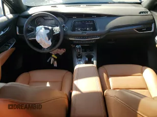 2023 Cadillac XT4 AWD Premium Luxury z VIN 1GYFZDR44PF206176, wystawiony jako Copart lot #46456445 z przebiegiem 3 896 mil mil oraz Szkoda całkowita • Salvage title. Historia ofert i sprzedaży dostępna na DreamBid. Obrazek 8.