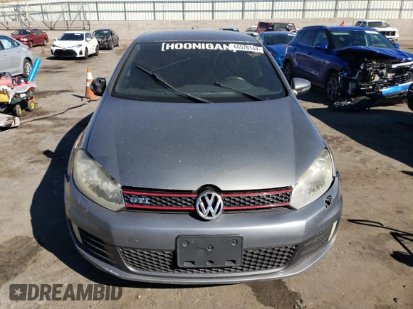 2013 Volkswagen GTI Wolfsburg Edition с VIN WVWHV7AJ6DW082937, выставлен на аукционе Copart как лот 68578144 с пробегом 107 084 миль миль и Списание • Salvage title. История ставок и продаж доступна на DreamBid. Изображение 5.