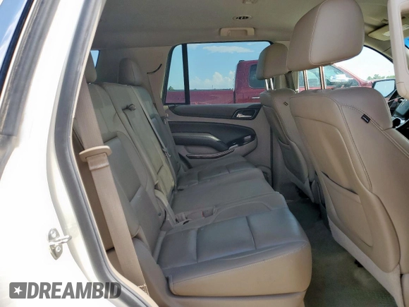 2015 Chevrolet Tahoe LT with VIN 1GNSCBKC5FR302611, listed as a Copart auction lot 62068165 with 184,136 mi miles and Salvage title. Bid and sale history available at DreamBid. Image 11.