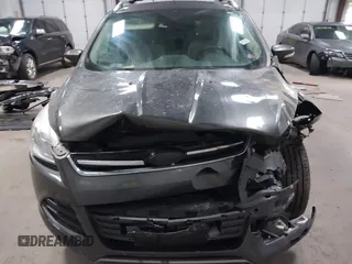 2016 Ford Escape Titanium with VIN 1FMCU9J90GUB35593, listed as a IAAI auction lot 42309020 with 173,019 mi miles and . Bid and sale history available at DreamBid. Image 12.