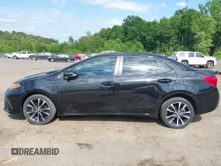 2019 Toyota Corolla L with VIN 5YFBURHE1KP923291, listed as a IAAI auction lot 42173538 with 60,184 mi miles and . Bid and sale history available at DreamBid. Image 14.