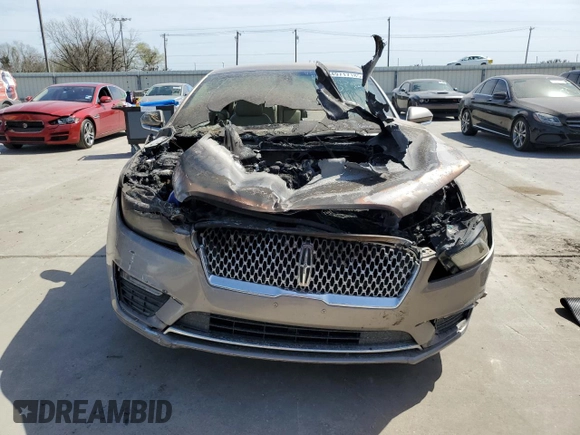 2019 Lincoln MKZ Standard z VIN 3LN6L5A98KR631346, wystawiony jako Copart lot #49717185 z przebiegiem Nie podano mil oraz Nie do naprawy. Historia ofert i sprzedaży dostępna na DreamBid. Obrazek 5.