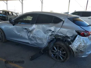 2018 Mazda 3 Touring with VIN 3MZBN1L31JM163466, listed as a IAAI auction lot 40777124 with 101,497 mi miles and . Bid and sale history available at carsss.com. Image 6.