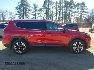 2020 Hyundai Santa Fe Limited with VIN 5NMS53AA2LH283122, listed as a IAAI auction lot 41259980 with 16,080 mi miles and . Bid and sale history available at DreamBid. Image 14.