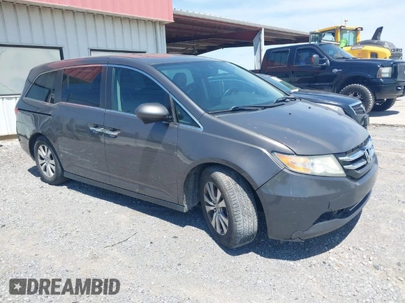 2014 Honda Odyssey EX-L with VIN 5FNRL5H6XEB111412, listed as a IAAI auction lot 41917361 with 210,841 mi miles and . Bid and sale history available at carsss.com. Image 1.
