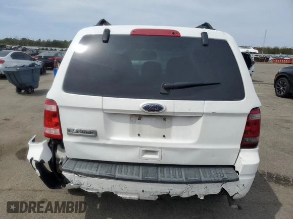 2010 Ford Escape Hybrid z VIN 1FMCU5K30AKC13098, wystawiony jako Copart lot #53623855 z przebiegiem 206 975 mil mil oraz Szkoda całkowita • Salvage title. Historia ofert i sprzedaży dostępna na DreamBid. Obrazek 6.