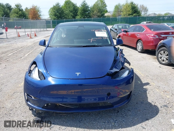 2023 Tesla Model Y Long Range with VIN 7SAYGDEE7PF702051, listed as a IAAI auction lot 42074182 with 50,473 mi miles and . Bid and sale history available at DreamBid. Image 11.