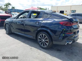 2024 BMW X6 xDrive40i with VIN 5UX33EX07R9V74903, listed as a IAAI auction lot 42063171 with 22,384 mi miles. Bid and sale history available at carsss.com. Image 3.