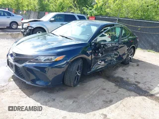2018 Toyota Camry LE with VIN 4T1B11HK2JU579550, listed as a IAAI auction lot 42309663 with 40,868 mi miles and . Bid and sale history available at DreamBid. Image 2.
