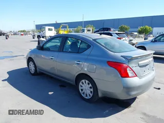 2013 Nissan Versa SV with VIN 3N1CN7AP5DL858384, listed as a IAAI auction lot 42543483 with 133,602 mi miles and . Bid and sale history available at DreamBid. Image 3.
