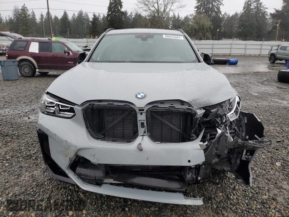 2022 BMW X3 M z VIN 5YM13EC02N9K67297, wystawiony jako Copart lot #86645084 z przebiegiem 23 792 mil mil oraz Szkoda całkowita • Salvage title. Historia ofert i sprzedaży dostępna na DreamBid. Obrazek 5.