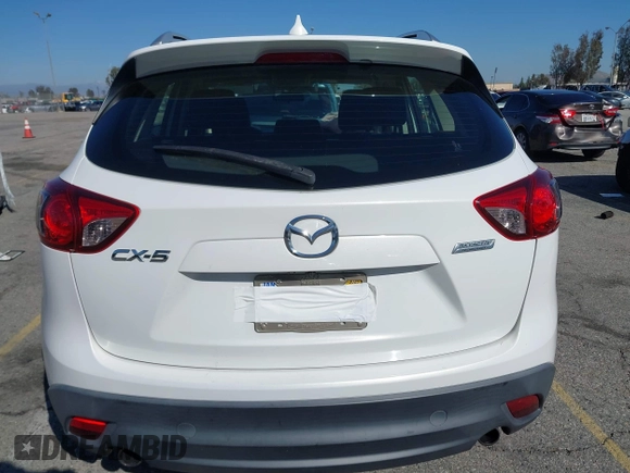 2016 Mazda CX-5 Sport with VIN JM3KE2BY9G0879654, listed as a IAAI auction lot 41819154 with 65,586 mi miles. Bid and sale history available at carsss.com. Image 16.