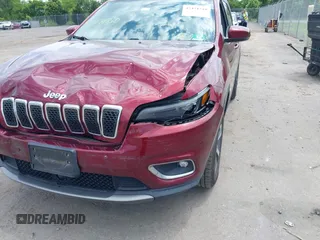 2019 Jeep Cherokee Limited with VIN 1C4PJMDXXKD323087, listed as a IAAI auction lot 42471210 with 57,839 mi miles and . Bid and sale history available at DreamBid. Image 6.