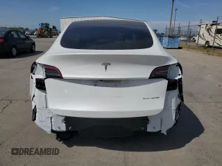 2024 Tesla Model Y Long Range с VIN 7SAYGDEE1RF152168, выставлен на аукционе Copart как лот 52436135 с пробегом 3 546 миль миль и Списание • Salvage title. История ставок и продаж доступна на DreamBid. Изображение 6.