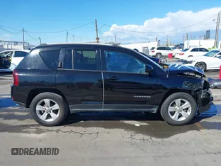 2016 Jeep Compass Latitude with VIN 1C4NJCEB2GD628384, listed as a IAAI auction lot 41752694 with 122,589 mi miles. Bid and sale history available at carsss.com. Image 13.