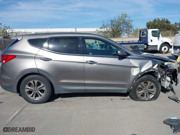 2015 Hyundai Santa Fe Sport with VIN 5XYZTDLB2FG294782, listed as a IAAI auction lot 41970007 with 144,531 mi miles. Bid and sale history available at carsss.com. Image 14.