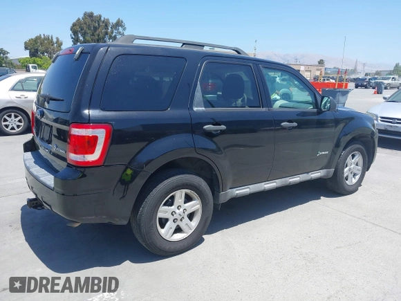 2009 Ford Escape Hybrid with VIN 1FMCU59369KB78293, listed as a IAAI auction lot 42478254 with 145,158 mi miles and . Bid and sale history available at DreamBid. Image 4.