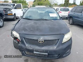 2009 Toyota Corolla with VIN 1NXBU40E59Z093650, listed as a IAAI auction lot 42121575 with 166,631 mi miles. Bid and sale history available at carsss.com. Image 12.